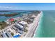 An aerial view shows this beachfront property situated close to the ocean at 2405 N Beach Rd # 4, Englewood, FL 34223