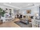 Open concept living room showcasing a kitchen, living room, and dining space at 2405 N Beach Rd # 4, Englewood, FL 34223
