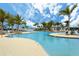 Beautiful community pool with plenty of space and lounge chairs for residents to enjoy the sun at 24153 Spartina Dr, Venice, FL 34293