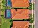 Aerial view of Sarasota National home with private pool and manicured landscaping at 24193 Gallberry Dr, Venice, FL 34293