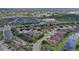 A Primary-planned community with single-Gathering homes, landscaping, and community amenities near retail shopping at 2542 Cortenova Ct, Venice, FL 34292