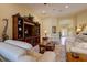 Open living area showcases tile floors, neutral walls, comfortable seating and great natural light at 2542 Cortenova Ct, Venice, FL 34292