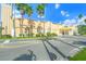 The Venice Theatre featuring its yellow facade and manicured landscaping, inviting patrons to enjoy the arts at 2542 Cortenova Ct, Venice, FL 34292