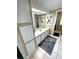 Bathroom featuring shell art, white cabinets, and a large mirror over the sink at 262 Mariner Dr, North Port, FL 34287