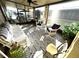 Enclosed patio featuring outdoor seating, a barbecue grill, ceiling fan and an open view at 262 Mariner Dr, North Port, FL 34287