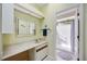 Bathroom with vanity, shower stall, and a neutral color palette at 269 Southampton Dr # 303, Venice, FL 34293