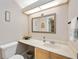 Bathroom featuring vanity with decorative nautical accessories and good lighting at 269 Southampton Dr # 303, Venice, FL 34293