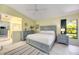Bedroom with a neutral color palette, tile flooring, and natural light at 269 Southampton Dr # 303, Venice, FL 34293