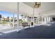 Picturesque walkway with bench, offering serene views of the adjacent pond and landscape at 269 Southampton Dr # 303, Venice, FL 34293