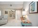 Welcoming foyer with tile floors, soothing decor and an open layout leading to the comfortable living spaces at 269 Southampton Dr # 303, Venice, FL 34293