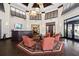 Bright and open lobby featuring comfortable seating, a reception desk, and modern decor with lots of natural light at 269 Southampton Dr # 303, Venice, FL 34293