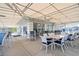 Inviting outdoor dining area with seating and shaded canopy at 269 Southampton Dr # 303, Venice, FL 34293