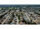 Aerial shot of residential area, pinpointing a home with mature trees at 271 Manor Rd, Venice, FL 34293