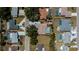 Overhead view of a residential area, featuring the home with a private screened pool at 271 Manor Rd, Venice, FL 34293