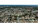 Home in a residential area with trees and landscaping at 271 Manor Rd, Venice, FL 34293