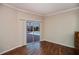 Bright room with sliding glass doors leading to the pool area at 271 Manor Rd, Venice, FL 34293