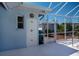 Outdoor pool shower featuring tiled surround and easy access to the pool at 271 Manor Rd, Venice, FL 34293