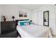 This bedroom has a Queen bed, closet and matching dresser and nightstand at 3006 Caring Way # 304, Port Charlotte, FL 33952