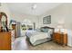 Serene bedroom featuring a comfortable bed, tiled floor, and scenic view, providing a relaxing retreat at 3337 Pine Shadow Cir, North Port, FL 34287