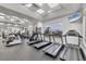 Fitness center interior with modern treadmills, elliptical machines, and weight training equipment at 3337 Pine Shadow Cir, North Port, FL 34287