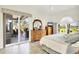 Bright bedroom with sliding glass door to a screened lanai, a comfy bed, and natural light, offering a peaceful retreat at 3337 Pine Shadow Cir, North Port, FL 34287