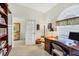 Home office with french door and custom computer desk at 3337 Pine Shadow Cir, North Port, FL 34287