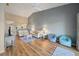 Bright living area with comfortable seating, a large window, and stylish decor at 414 Laurel Lake Dr # 203, Venice, FL 34292