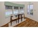 Picturesque dining nook with views of the water and modern furnishings at 423 Pirates Pt, North Port, FL 34287