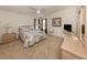 Serene main bedroom with neutral tones, ceiling fan, and ample closet space at 423 Pirates Pt, North Port, FL 34287