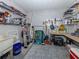 Organized storage room with shelving, work table, and space for tools, keeping your home clutter-free at 425 Pirates Pt, North Port, FL 34287