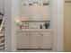 Classic built-in cabinets offering ample storage and decorative display space at 443 Landsedge Dr, North Port, FL 34287