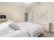 Comfortable bedroom featuring a white dresser and a world map wall decoration at 4641 Gaeta Dr, Venice, FL 34293