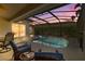 Outdoor screened pool with view of colorful sky at sunset at 4641 Gaeta Dr, Venice, FL 34293