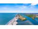 Beautiful aerial view showcasing oceanfront access, waterways, beaches and a gorgeous coastline at 511 Porpoise Rd, Venice, FL 34293