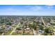 Real estate neighborhood with a view of the ocean in the background on a sunny day at 511 Porpoise Rd, Venice, FL 34293