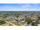 Real estate neighborhood with a clear blue sky and view of ocean in the background at 511 Porpoise Rd, Venice, FL 34293