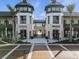 Exterior of attractive retail shops featuring unique architectural design and outdoor seating at 511 Porpoise Rd, Venice, FL 34293