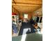 Functional garage with shelves, equipment, and overhead lighting, offering plenty of storage at 537 Amberjack Dr, North Port, FL 34287