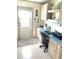 Dedicated office space with desk, chair, and storage cabinets, perfect for working from home at 537 Amberjack Dr, North Port, FL 34287