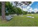 Lush green space with benches, offering a serene and relaxing outdoor retreat for residents at 553 Circlewood Dr # T11, Venice, FL 34293