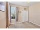 Comfortable bedroom with neutral carpet, ceiling fan, closet, and one windows with attractive views at 5641 Hidden Oak Ct, North Port, FL 34287