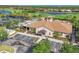 The community fitness center building with well-manicured landscaping at 5641 Hidden Oak Ct, North Port, FL 34287