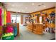 Pro shop with tennis equipment, tennis balls, and a counter at 5641 Hidden Oak Ct, North Port, FL 34287