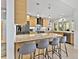Modern kitchen with custom wood cabinets, granite countertops, and stainless steel appliances at 608 Apalachicola Rd, Venice, FL 34285