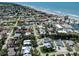 Expansive aerial view of community, beach, and surrounding neighborhood at 616 Gardenia Dr, Venice, FL 34285