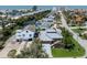 Gorgeous aerial view of home highlighting proximity to canal and beach at 616 Gardenia Dr, Venice, FL 34285