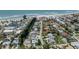 Picturesque neighborhood aerial showing property's location near a canal and ocean at 616 Gardenia Dr, Venice, FL 34285