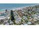 Beautiful neighborhood aerial showcasing property's location near a canal and beach at 616 Gardenia Dr, Venice, FL 34285