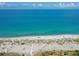 Beautiful view of the pristine beach with crystal clear ocean waters at 616 Gardenia Dr, Venice, FL 34285