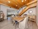 Dining room includes hardwood floors, wood ceiling accent, and natural light at 616 Gardenia Dr, Venice, FL 34285